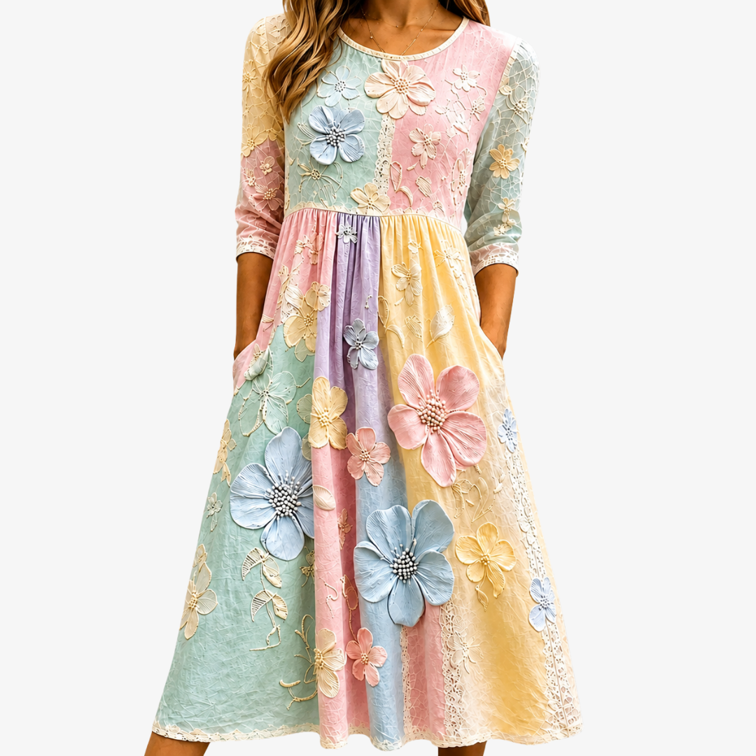 Ella | Midikjole med pastelfarvede blomster og lommer