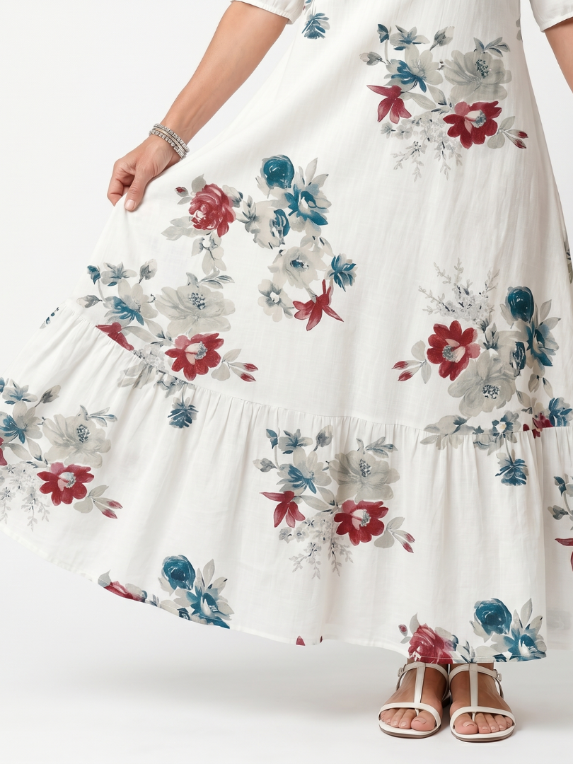 Maeva | Midikjole med spredt blomsterprint og kvastbindebånd