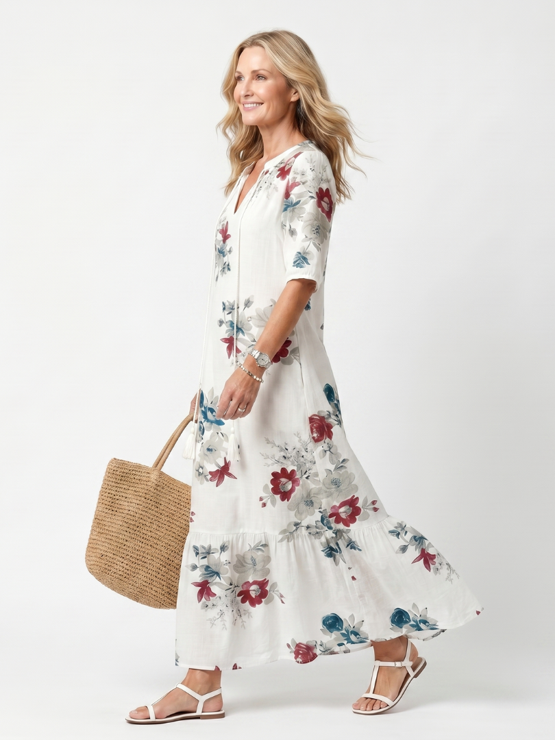 Maeva | Midikjole med spredt blomsterprint og kvastbindebånd