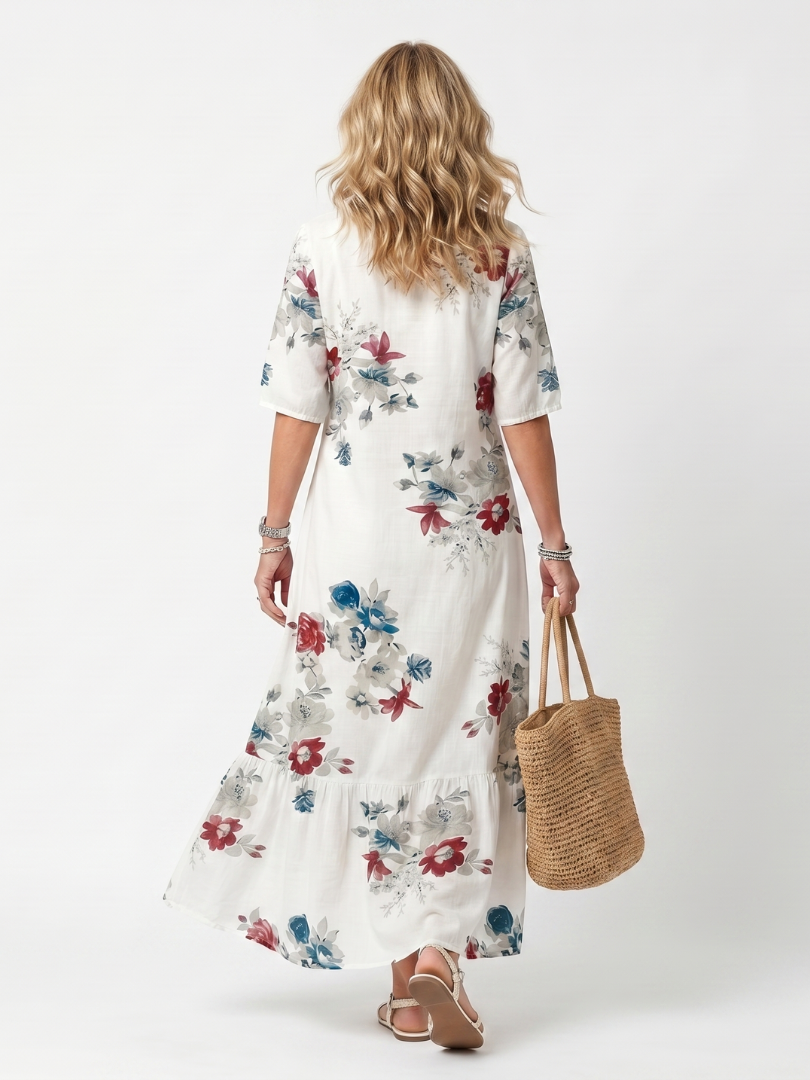 Maeva | Midikjole med spredt blomsterprint og kvastbindebånd