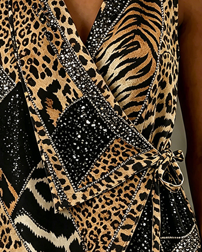 Klara | Ærmeløs bluse med leopardprint og bindedetalje