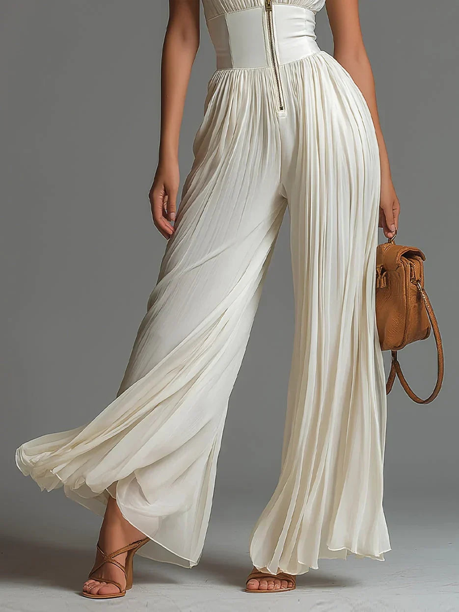 Élan – Skulpturelt plisseret jumpsuit