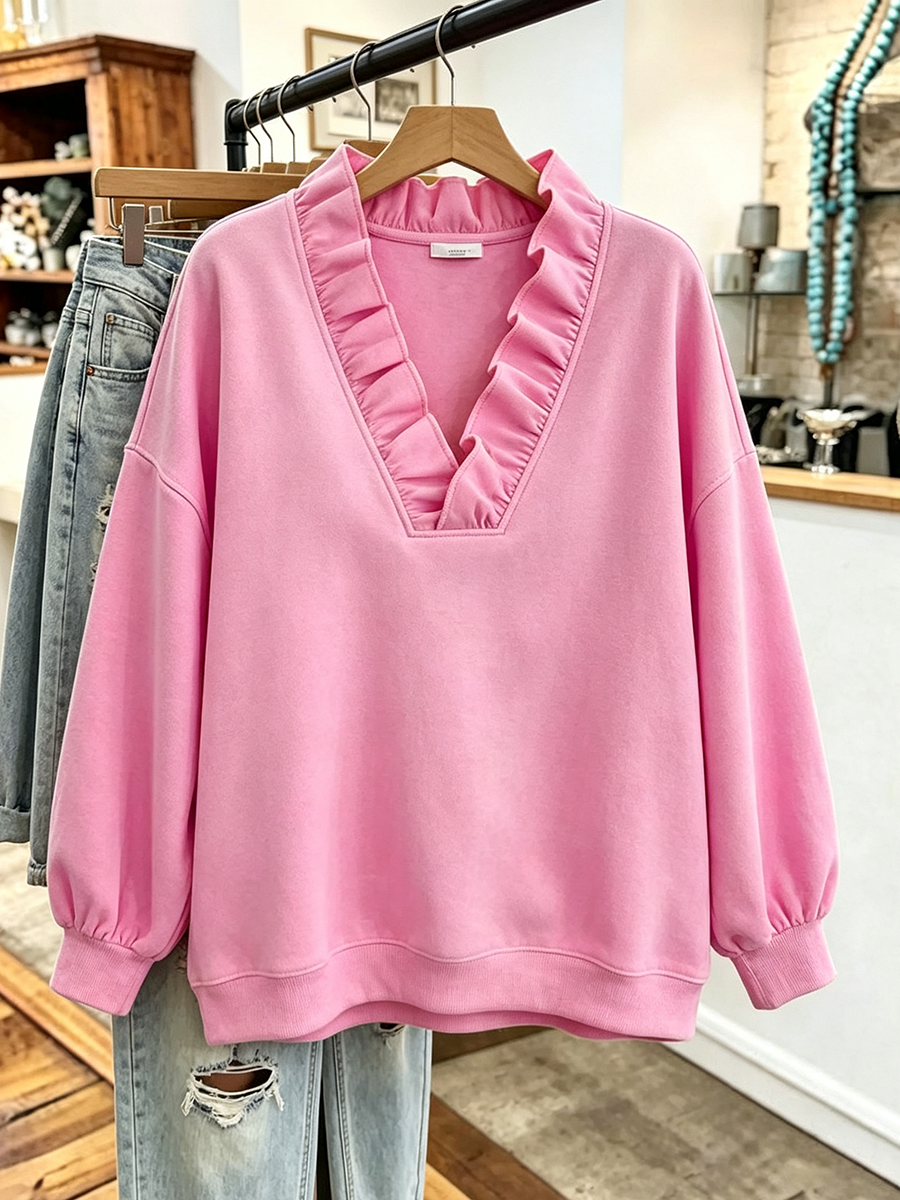 Frida | Oversized sweatshirt med flæsekant