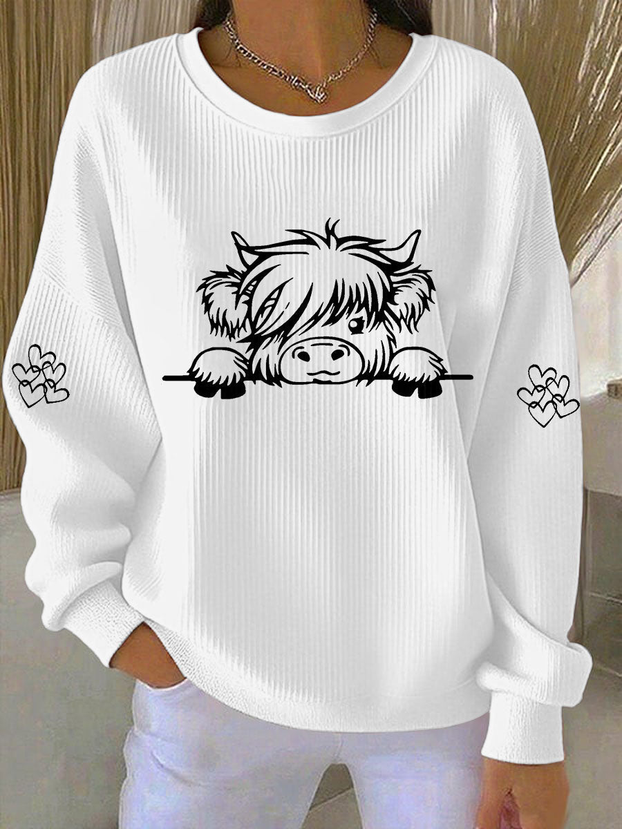 Kaya | Sweatshirt med højlandskvæg og print