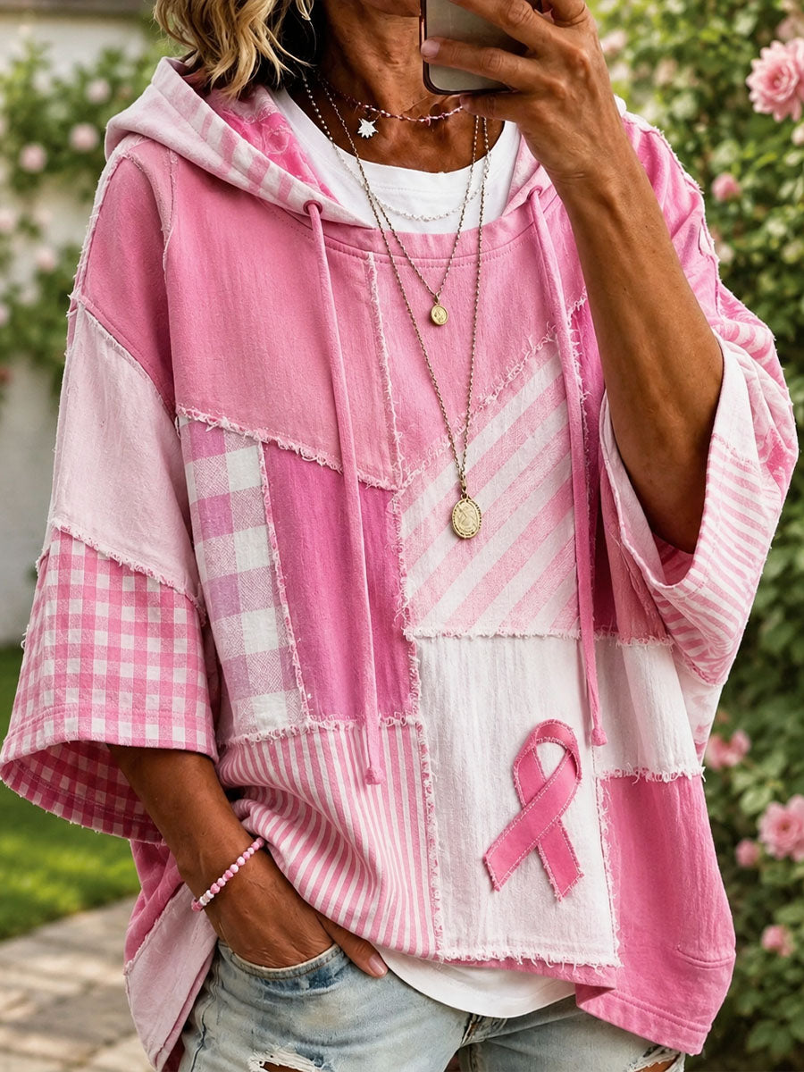 Frida | Rosa hoodie med patchwork- og styrkeprint