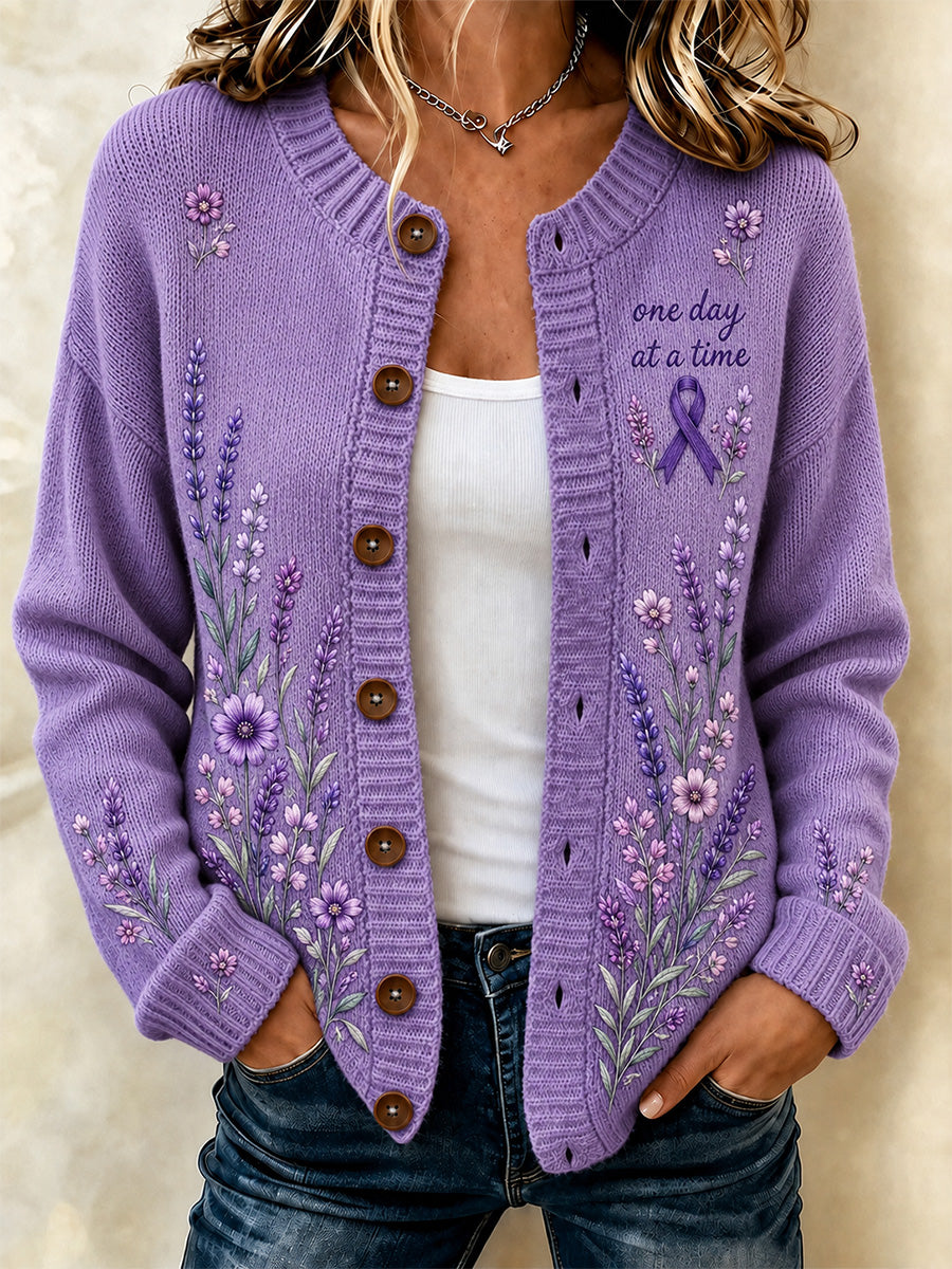 Asta | Feminin cardigan med lilla blomster og sløjfe