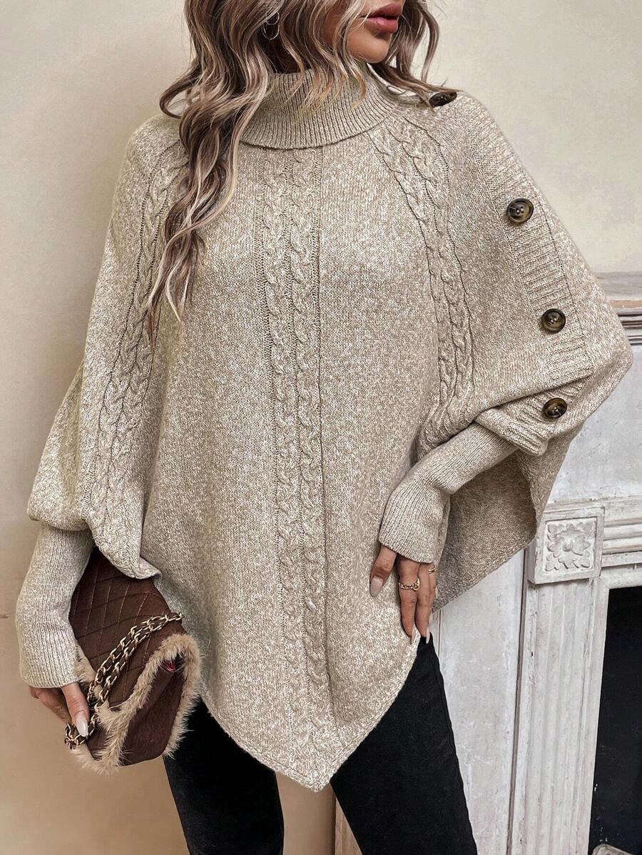 Alexis | Asymmetrisk kabelstrik-poncho med høj hals