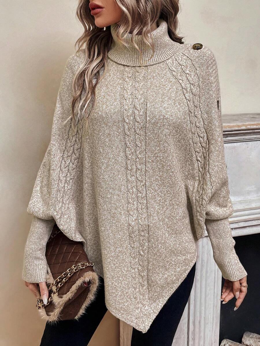 Alexis | Asymmetrisk kabelstrik-poncho med høj hals
