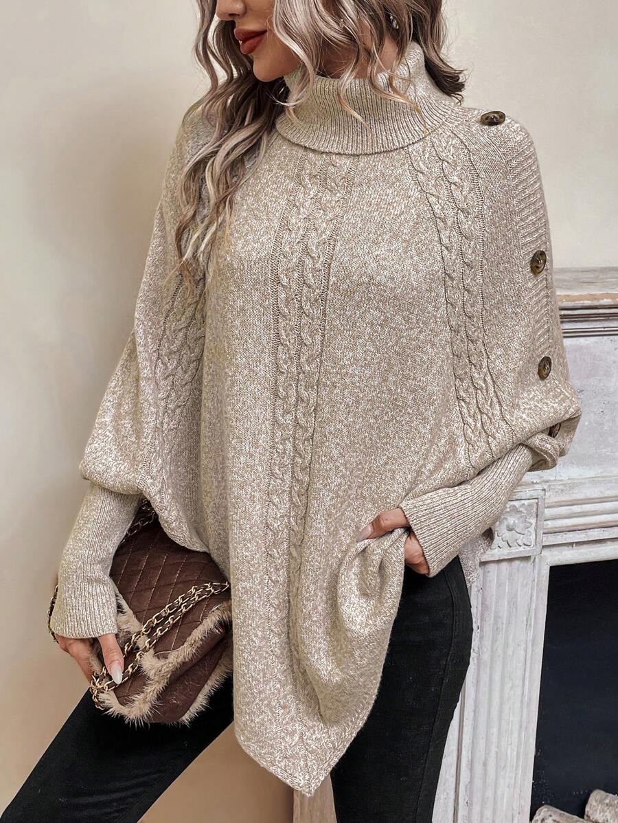 Alexis | Asymmetrisk kabelstrik-poncho med høj hals