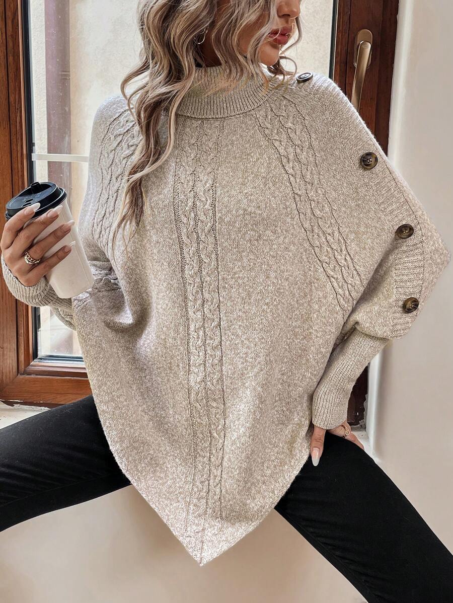 Alexis | Asymmetrisk kabelstrik-poncho med høj hals