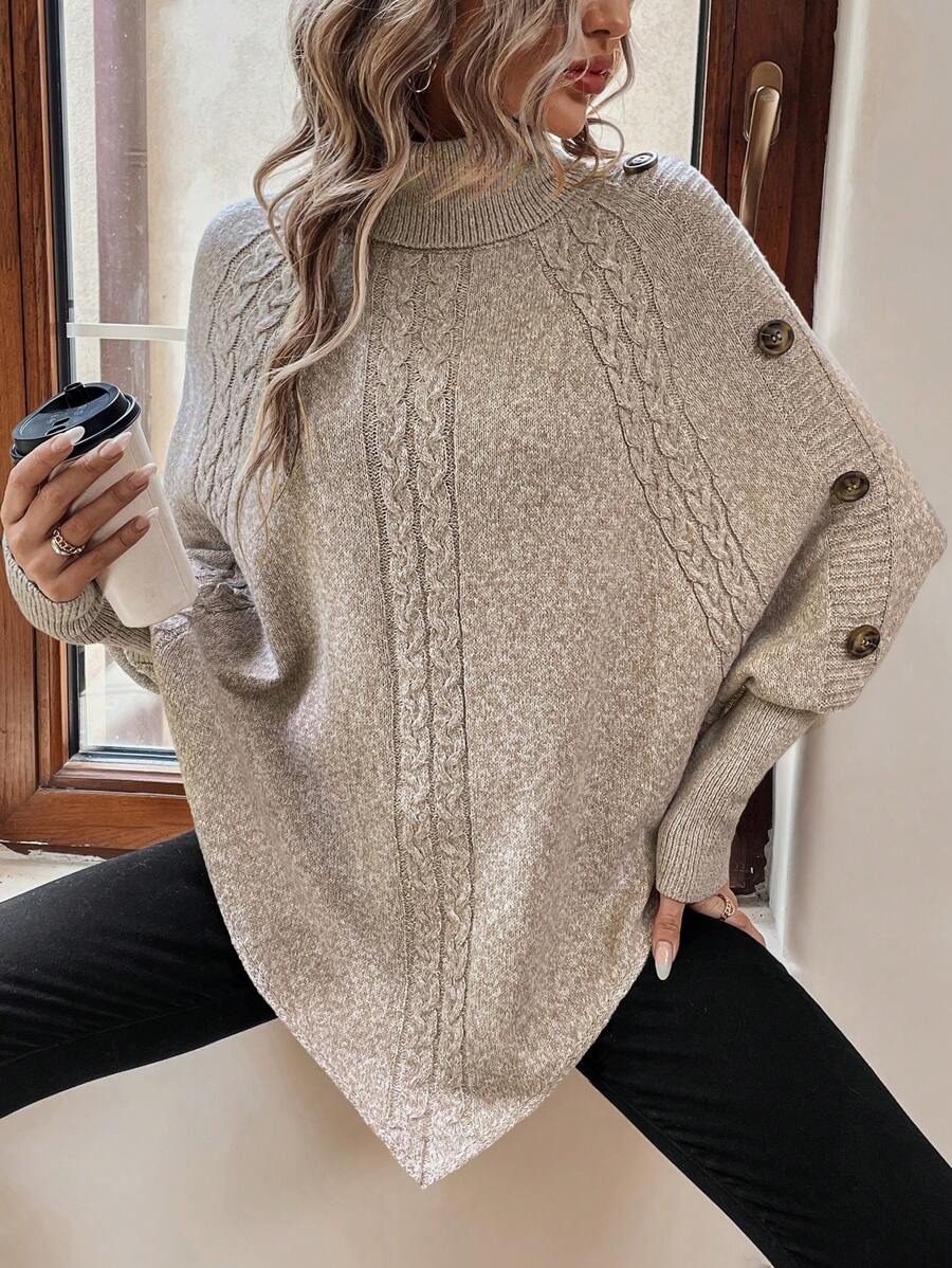 Alexis | Asymmetrisk kabelstrik-poncho med høj hals