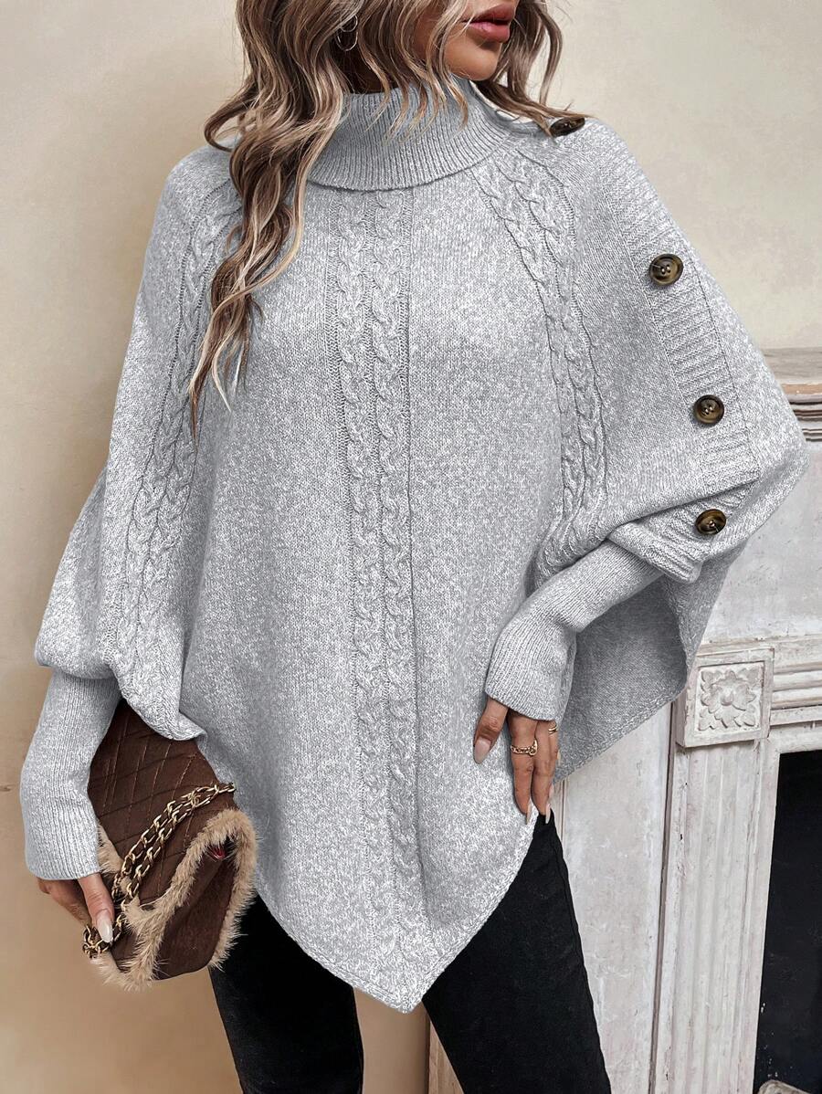 Alexis | Asymmetrisk kabelstrik-poncho med høj hals