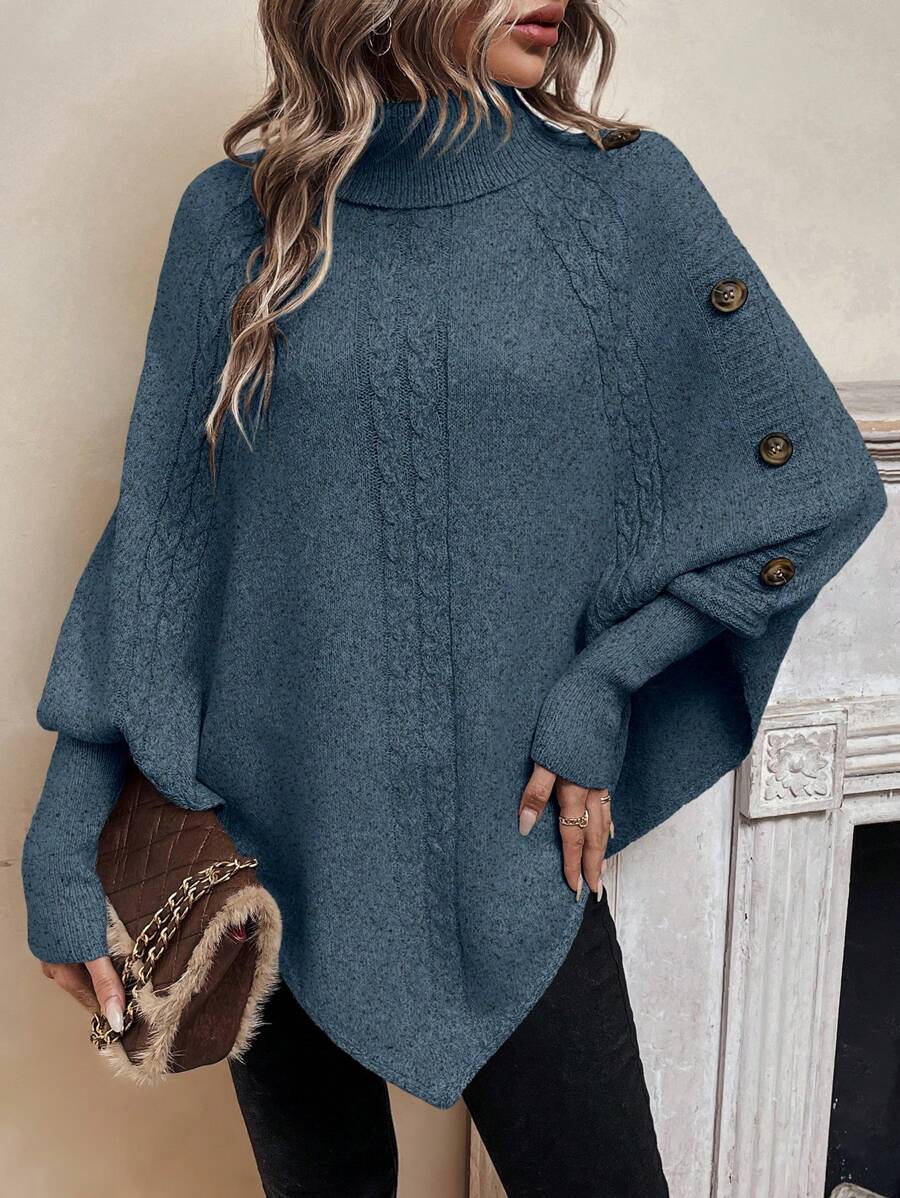 Alexis | Asymmetrisk kabelstrik-poncho med høj hals