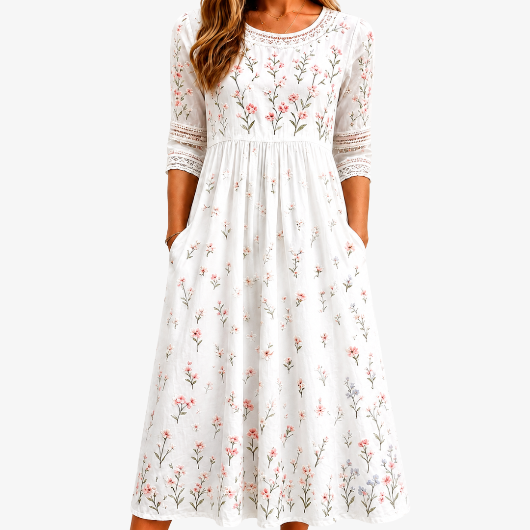 Karla | Midikjole med vilde blomster og lommer