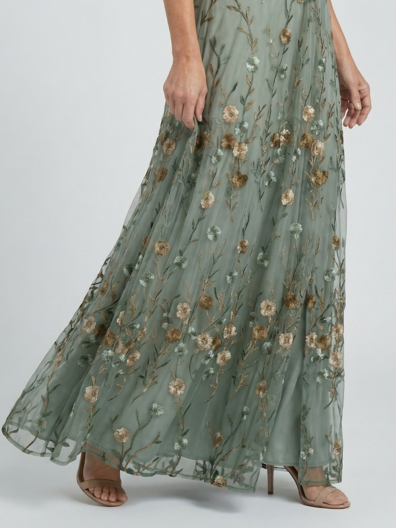 Selora | Blomstret halter-maxikjole med let fald