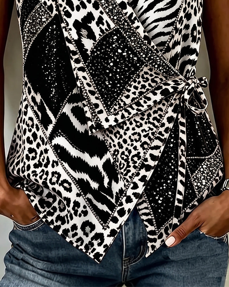 Klara | Ærmeløs bluse med leopardprint og bindedetalje