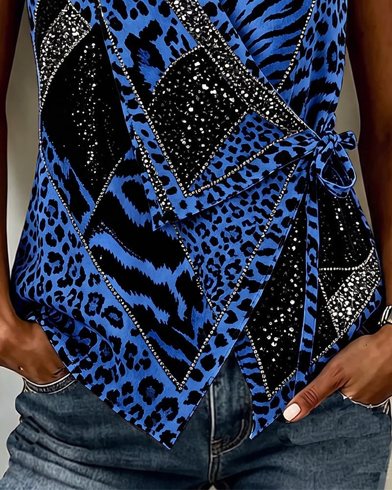 Klara | Ærmeløs bluse med leopardprint og bindedetalje