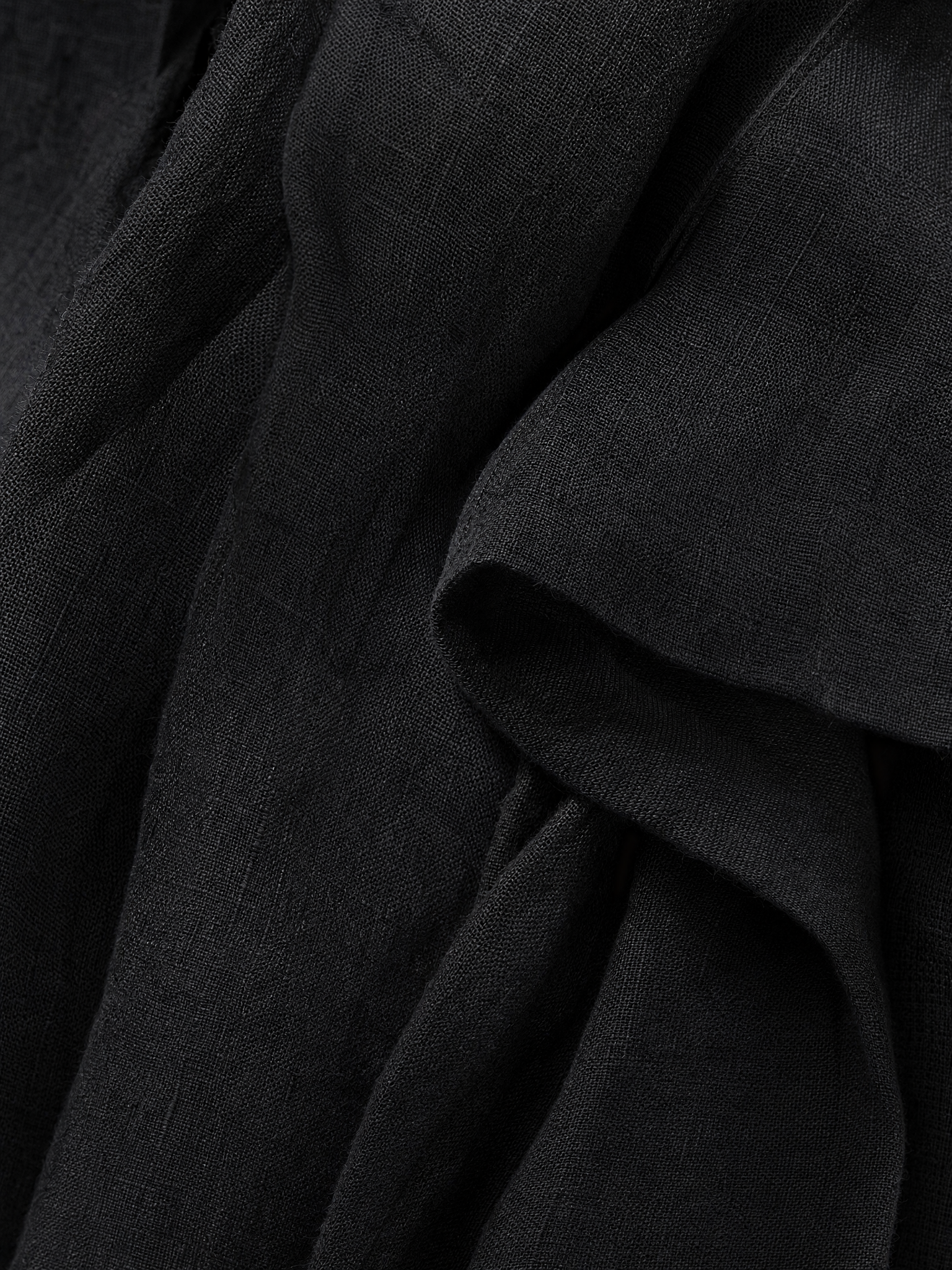 Mia | Ærmeløs jumpsuit med knaplukning