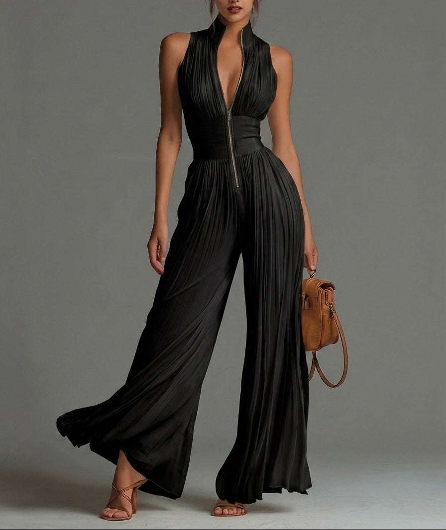 ÉLAN - Skulpturelt plisseret jumpsuit