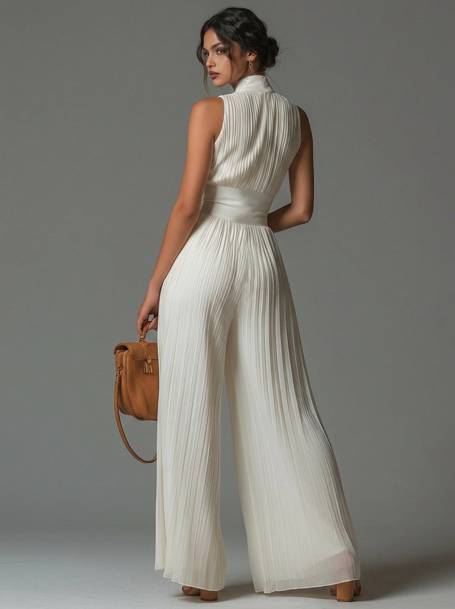 ÉLAN - Skulpturelt plisseret jumpsuit
