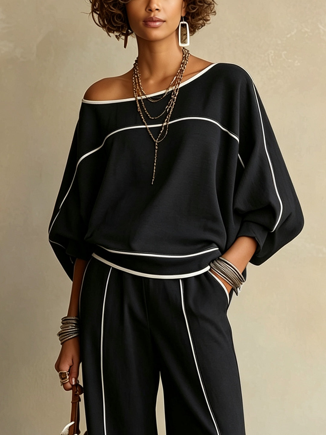 Rikke | Sort-hvid sæt med top og bukser med vide ben med off-shoulder