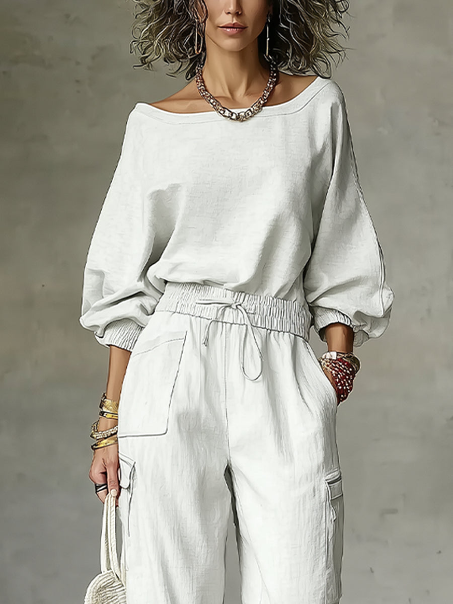 Nora | Hvid sæt med top og bukser med vide ben med off-shoulder