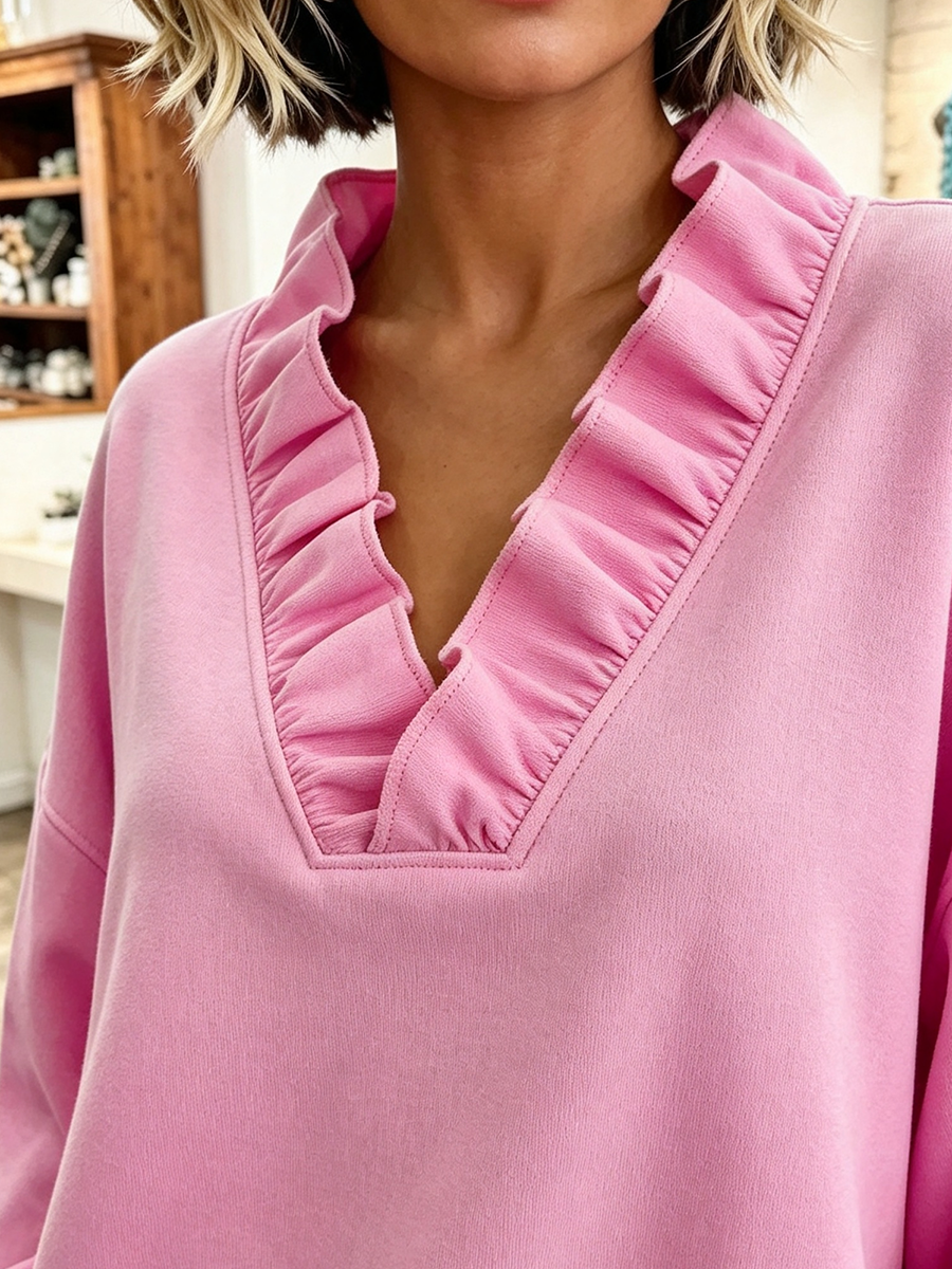 Frida | Oversized sweatshirt med flæsekant