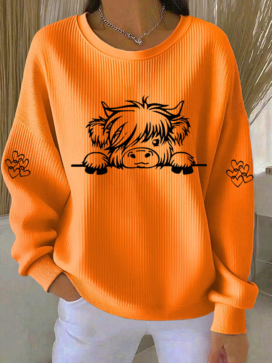 Kaya | Sweatshirt med højlandskvæg og print