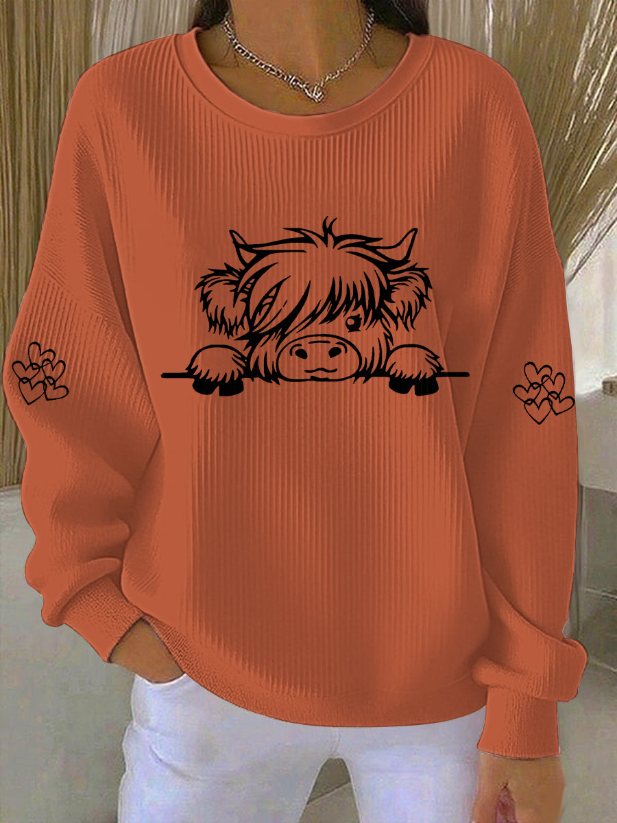 Kaya | Sweatshirt med højlandskvæg og print