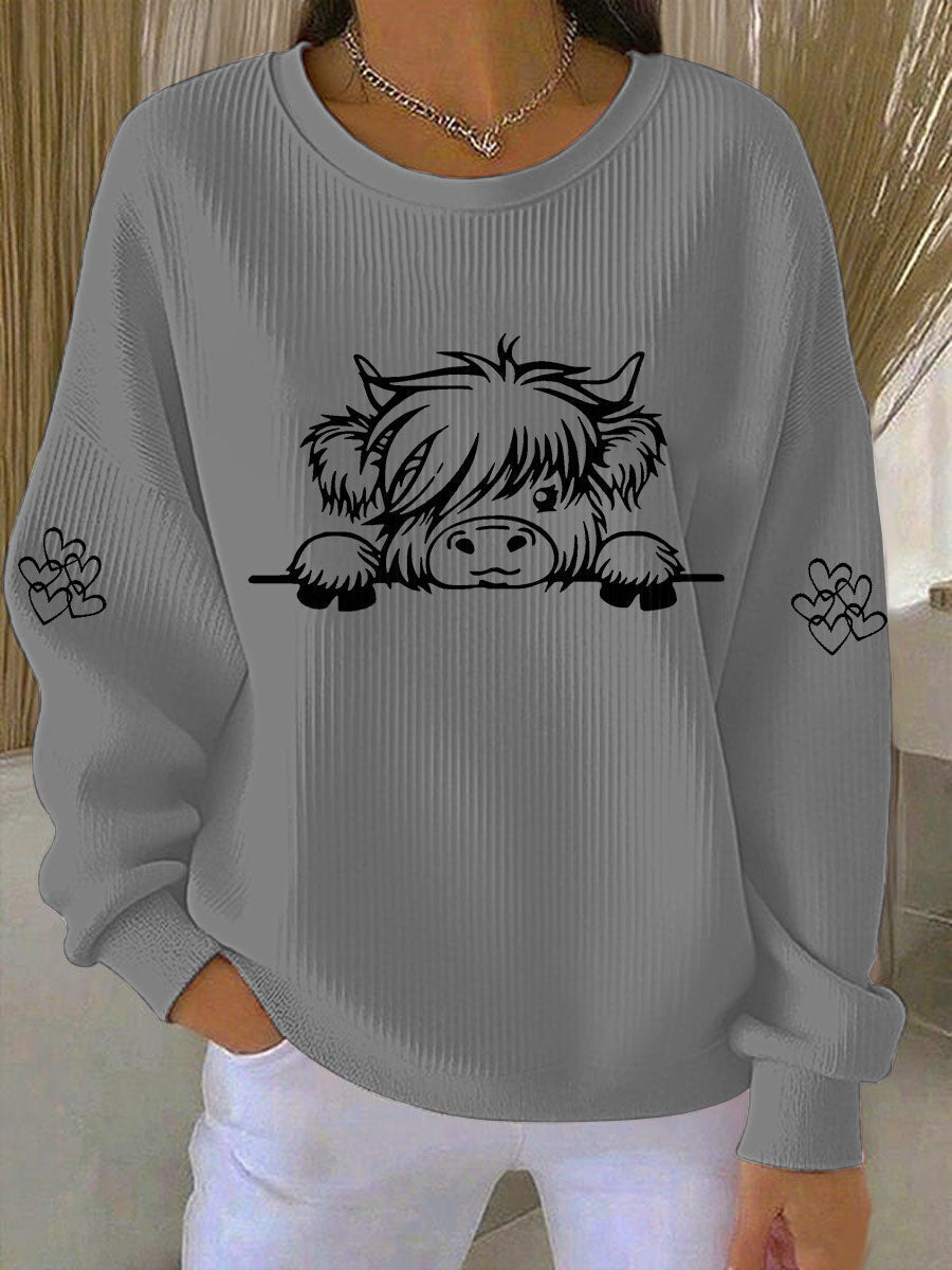 Kaya | Sweatshirt med højlandskvæg og print